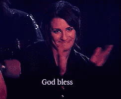 a woman says " god bless " while making a funny face