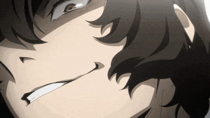 a close up of a person 's face with a smirk on their face