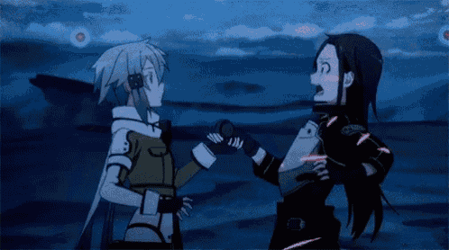 a couple of anime characters are hugging each other in a scene from sword art online .