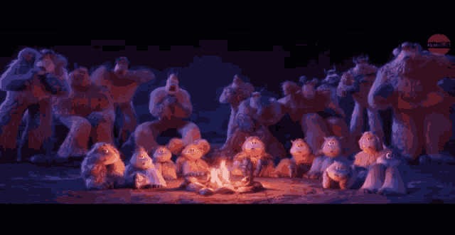 a group of cartoon yeti are sitting on the ground