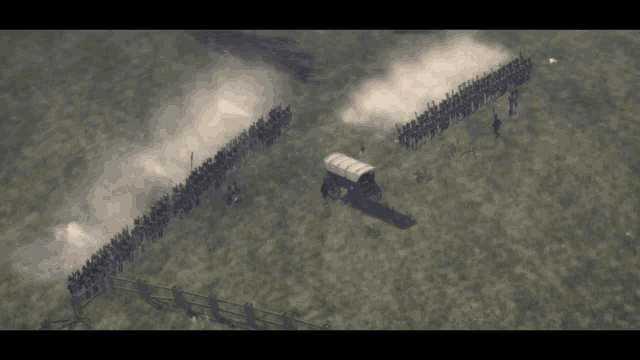 an aerial view of a military battle with smoke coming out of a cannon
