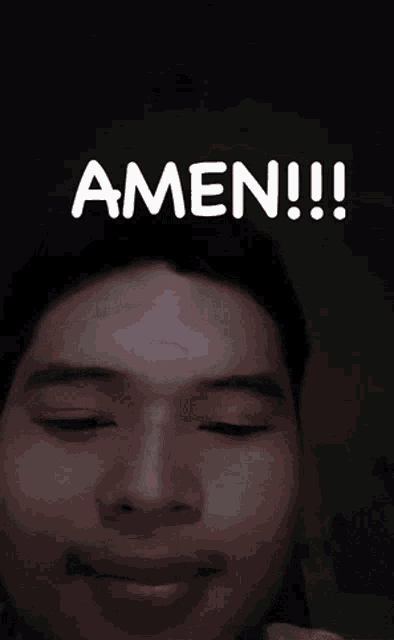 a man with his eyes closed says amen