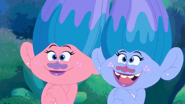 a pink and a blue troll are smiling and looking at each other