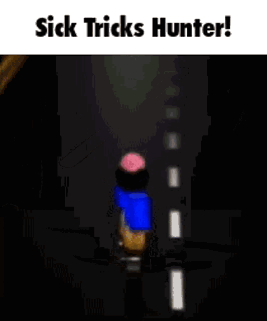 a man in a blue shirt is standing on a skateboard with the words sick tricks hunter below him