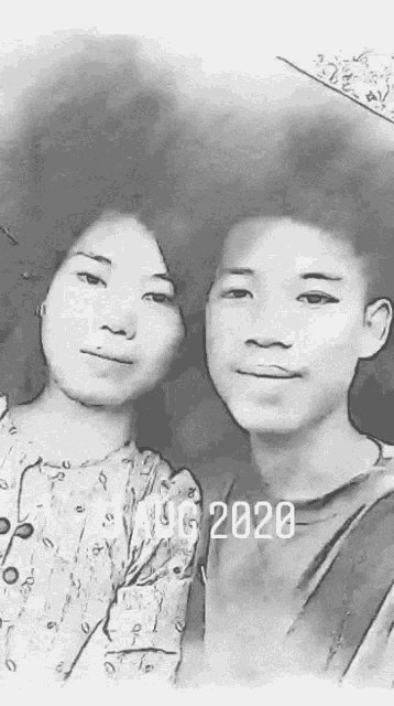 a black and white photo of a boy and a girl with the date august 2020 on the bottom