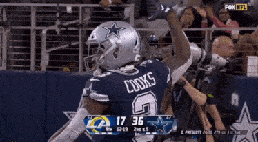 a fox nfl broadcast of a football game between the cowboys and the rams