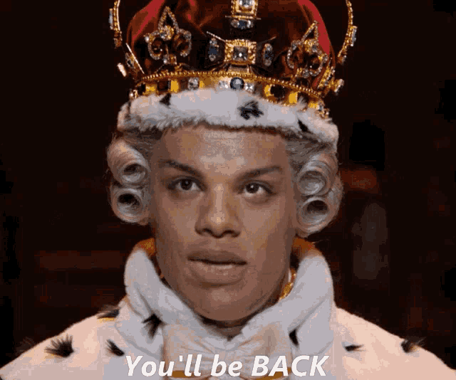 a man wearing a crown and a wig says you 'll be back