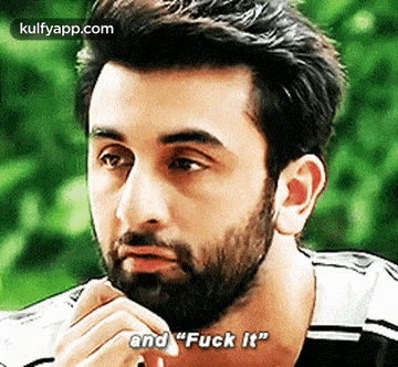 a man with a beard is talking and says " and fuck it " .