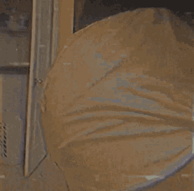 smoke is coming out of a doorway in a house