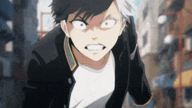 a close up of a person 's face with an angry look on their face