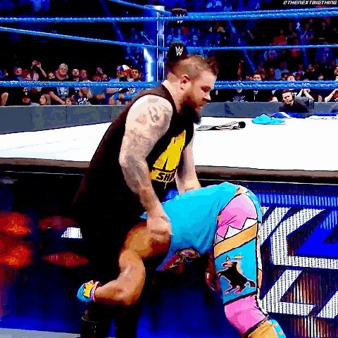 Kevin Owens Powerbomb GIF - Kevin Owens Powerbomb Xavier Woods GIFs