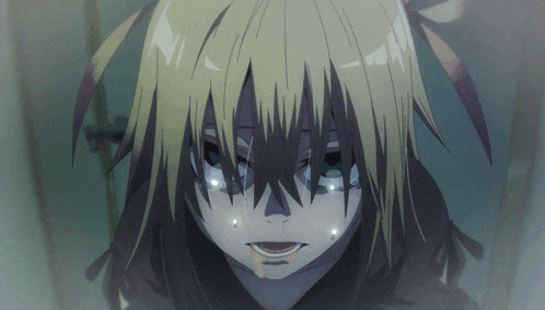 a close up of a person 's face with tears coming out of their eyes