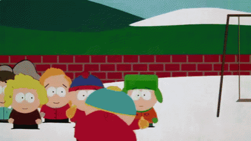 a group of south park characters standing in front of a brick wall
