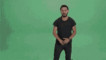a group of men are standing next to each other on a green background .
