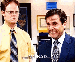 two men in suits and ties are standing next to each other and one of them is saying `` my bad ... ''