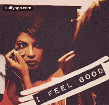 a picture of a woman applying makeup with a sign that says i feel good on it