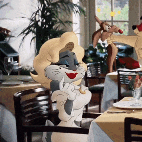 a cartoon character is sitting at a table with a plate of food