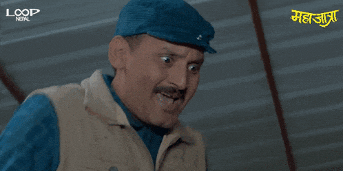 a man wearing a blue hat says omg in orange letters