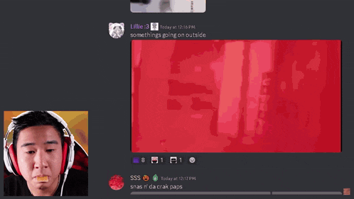 a man wearing headphones looks at a screen with a red background and says something going on outside