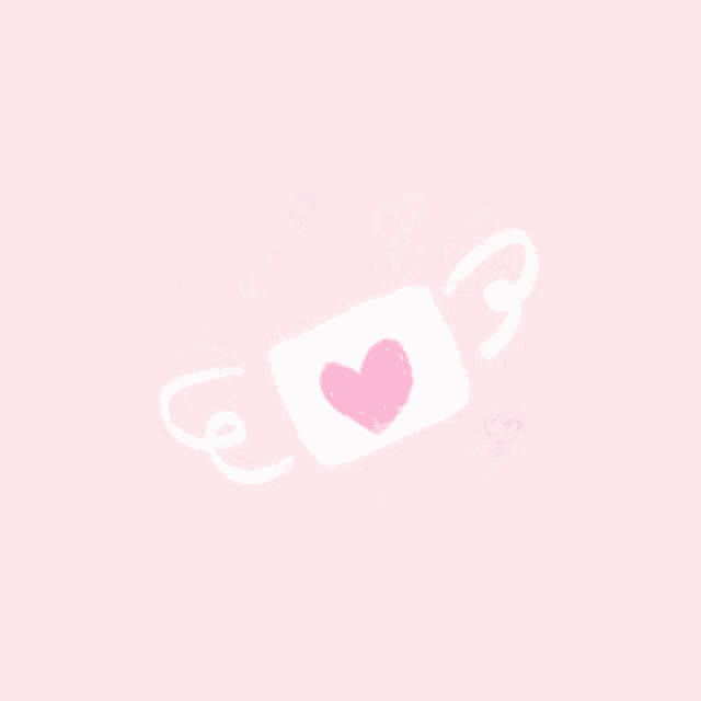 a pink envelope with a heart on it