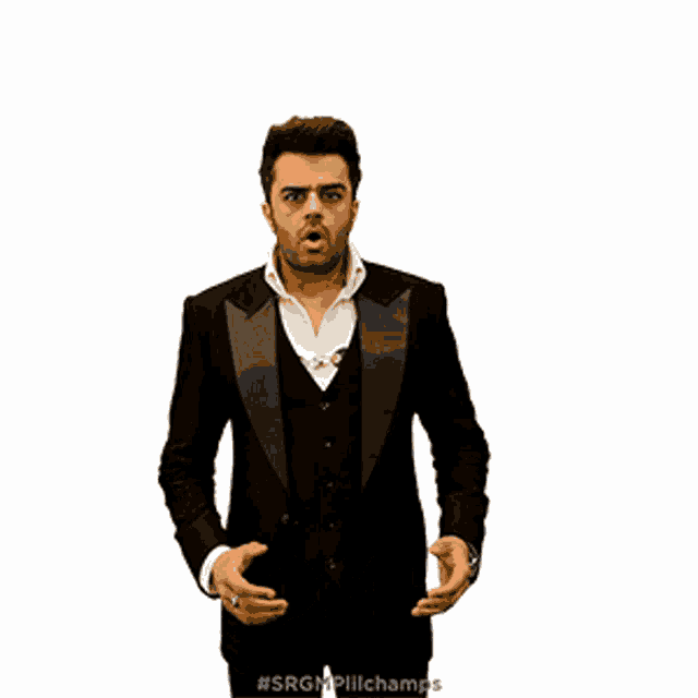 a man in a tuxedo with the word omp written on his chest