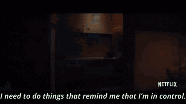a man is standing in a hallway talking about things that remind him that he is in control