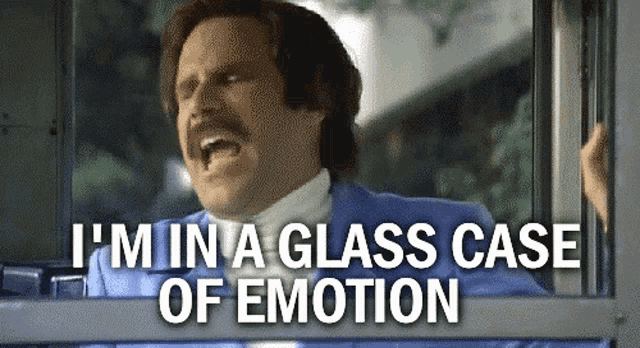 a man with a mustache is looking out of a window and says i 'm in a glass case of emotion .