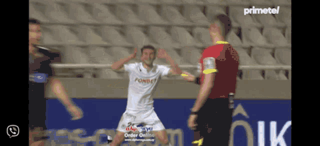 a soccer player wearing a white shirt with the word pondi on the front