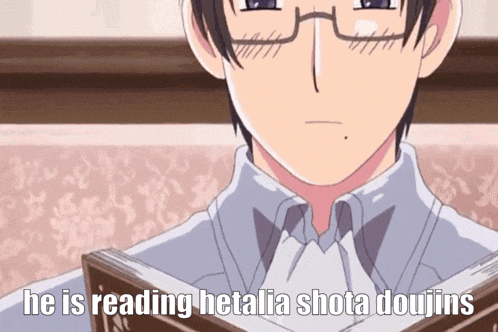 a man with glasses is reading a book with the words he is reading hetalia shota doujins