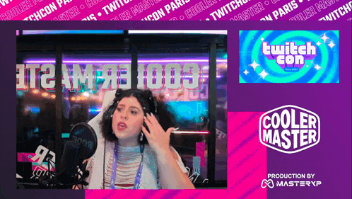 a woman wearing headphones stands in front of a microphone in front of a cooler master logo