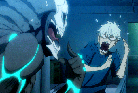 a man in a blue shirt is being attacked by a monster with teeth
