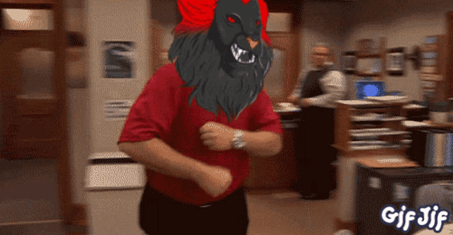 a man in a red shirt is dancing with a monster on his head and the words gif jif below him