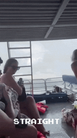 a group of people are sitting on a boat and the word straight is on the bottom