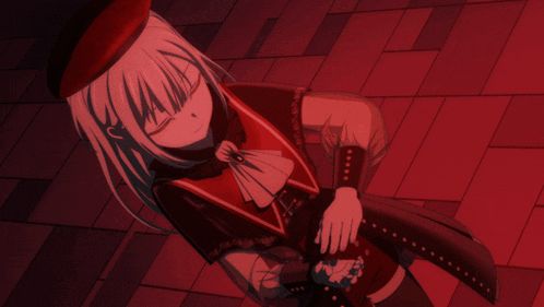 a girl with white hair and a red hat is laying on the floor