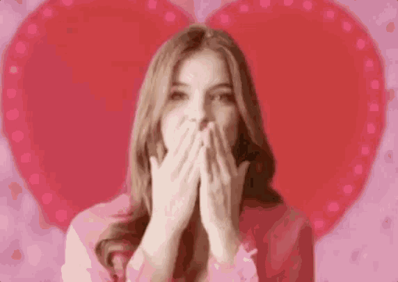 a woman is blowing a kiss with the words tchau amor written below her