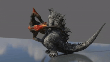 two monsters are fighting each other on a table