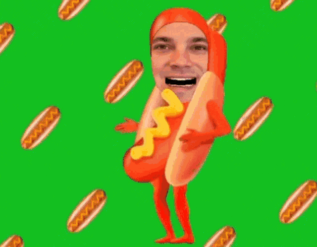 a man in a hot dog costume holds a hot dog with mustard on it