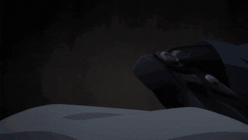 a person is laying down with their mouth open