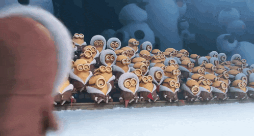 a group of minions wearing hooded jackets with the number 60 on them