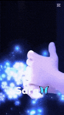 a person 's hand with the name sara on it