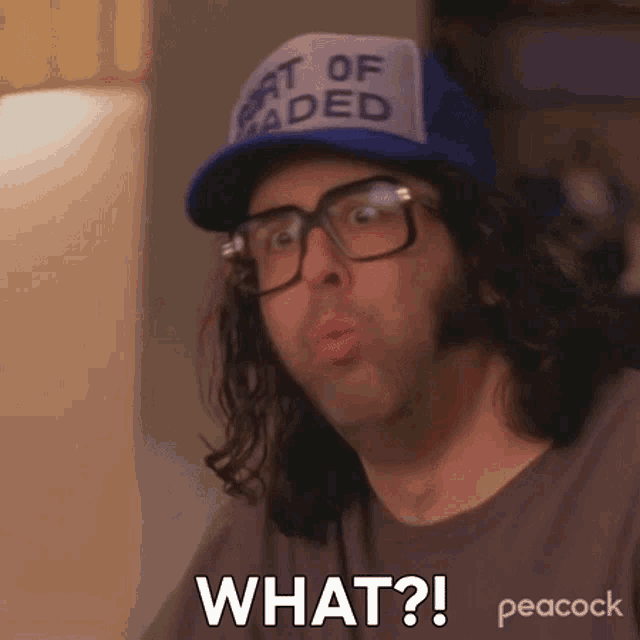 a man wearing glasses and a hat is asking what ?