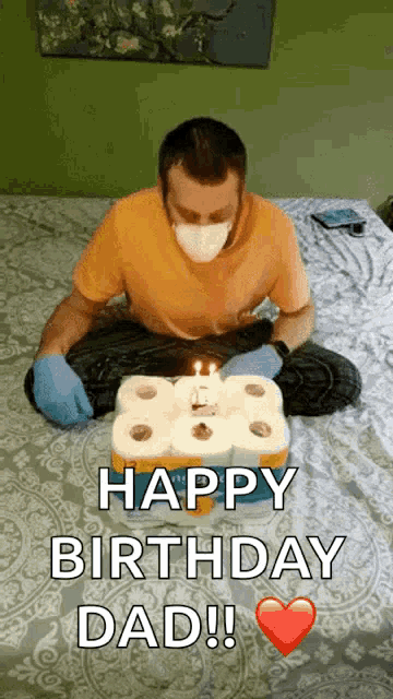 a man wearing a mask and gloves is celebrating his birthday