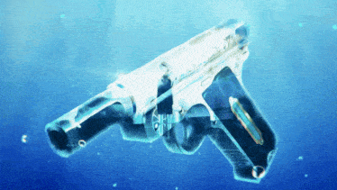 a gun is floating in the water with a reflection of a person 's face