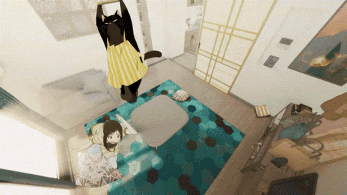 a girl laying on a couch with a cat hanging from the ceiling above her