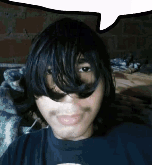 a young man with long black hair and a mustache is taking a selfie