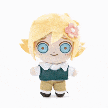 a stuffed doll with a flower in her hair is holding a metal bucket on his head .