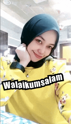 a woman wearing a hijab and a yellow shirt says ' awalikumsalam '