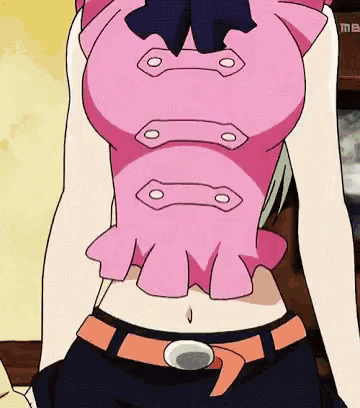 a close up of a woman 's stomach with a pink shirt and black shorts