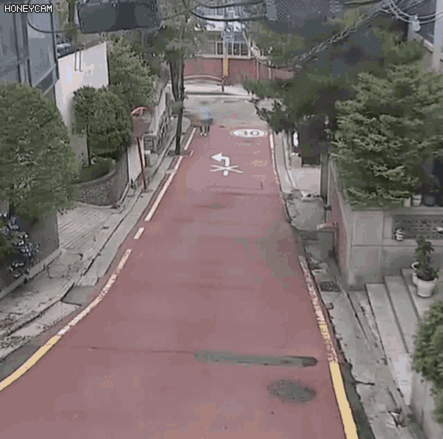 a person is walking down a street with a sign that says 30