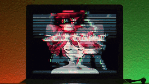 a computer screen shows a glitch image of a girl